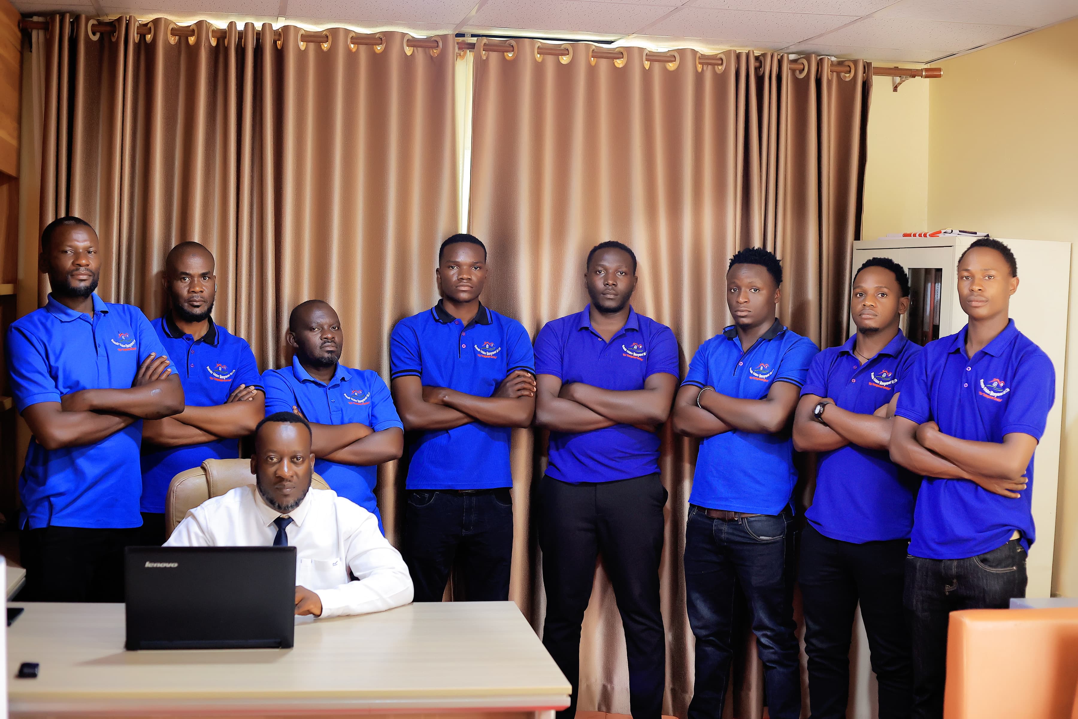Wamato Estates team standing together in the office