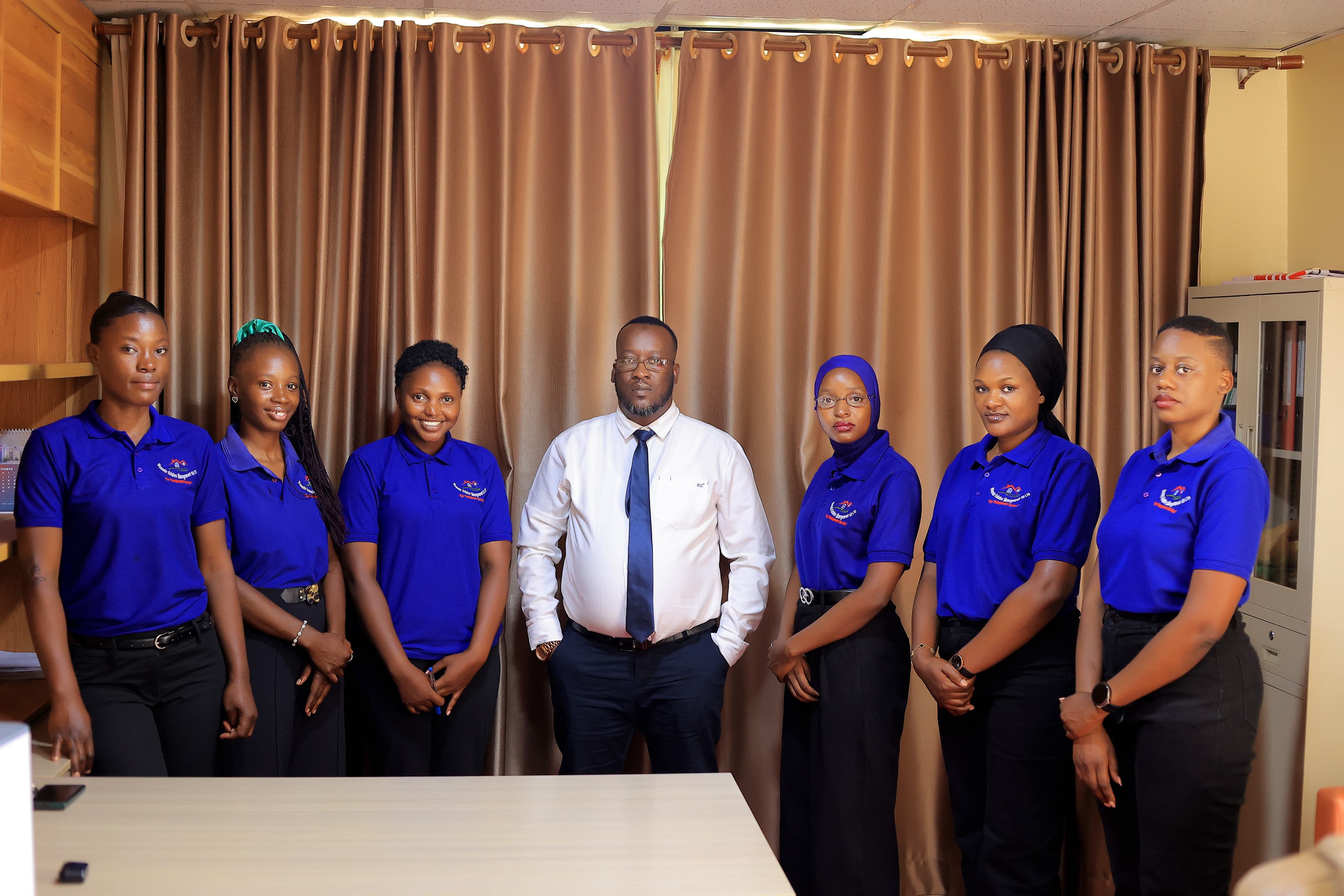 Wamato Estates team portrait with the managing director
