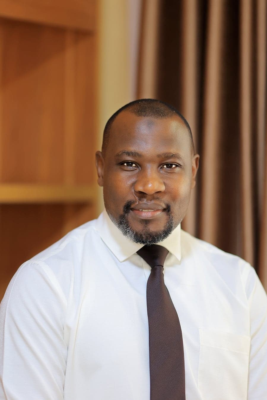 Portrait of Wamato Estates' Executive Director